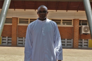 Newly ordained priest serving at the Uganda Martyrs Catholic Shrine.